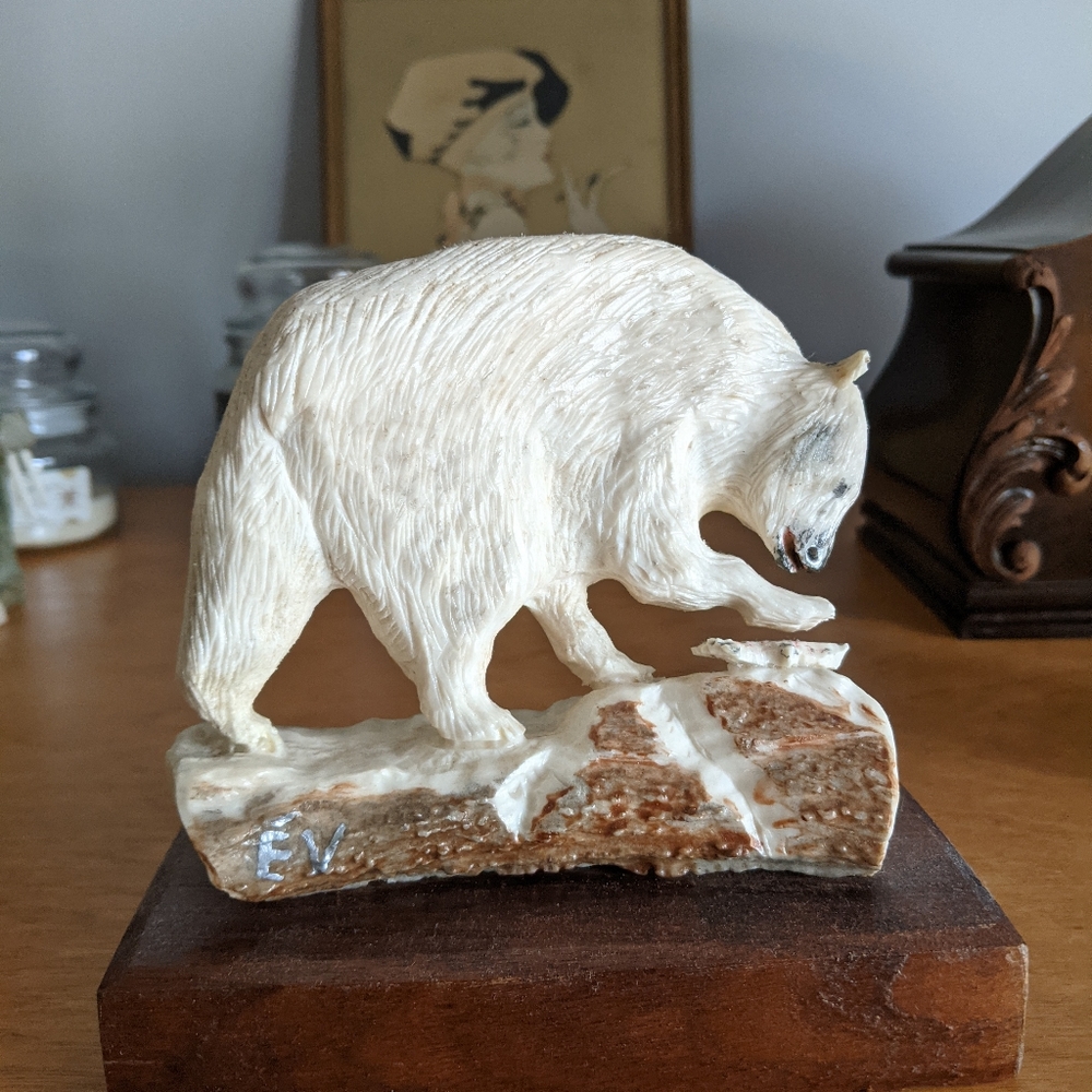 Sculpture of a bear with salmon